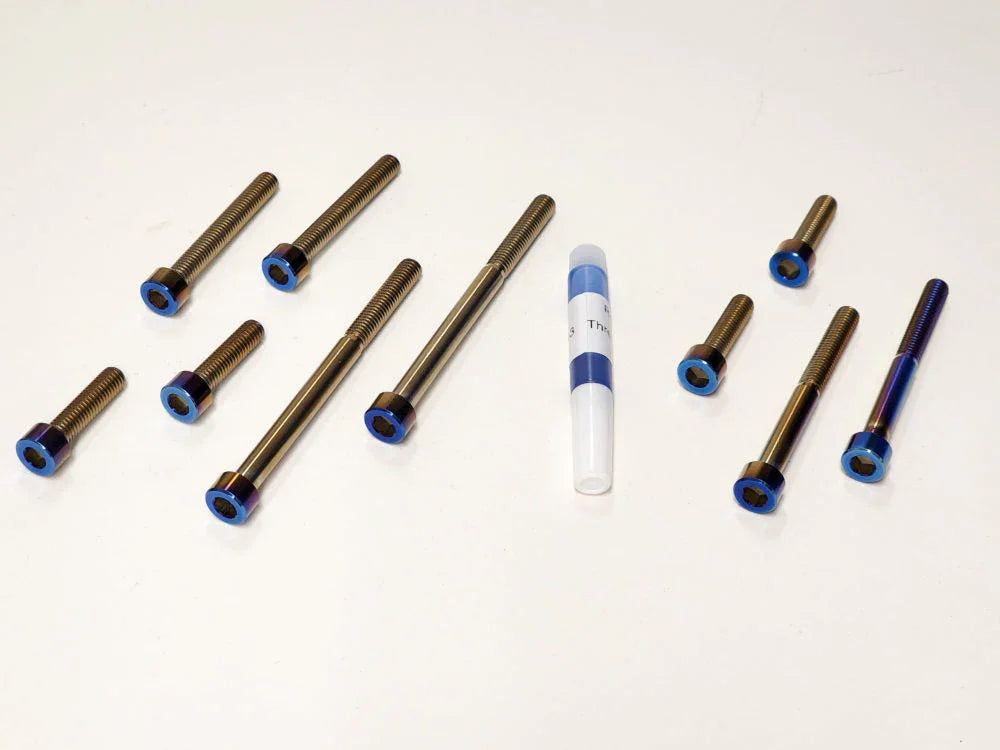 Warp 9 Bar Mount titanium burnt blue bolt kit with low and high setting bolts and blue threadlock for Surron Talaria E-Ride Pro