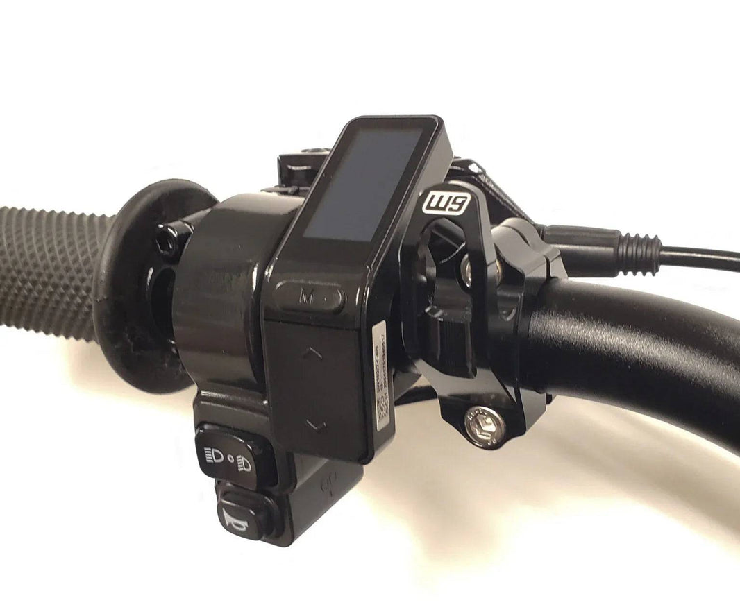 Warp 9 Helmet Hook made from 7075T6 aluminum securely holding a helmet on 7/8 handlebar bike mount