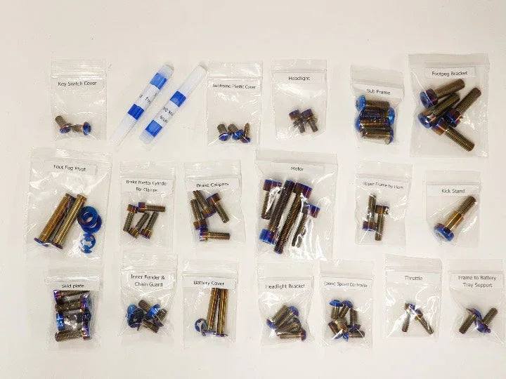 Warp 9 Surron Light X Bee titanium chassis bolt kit with key switch cover and frame bolts