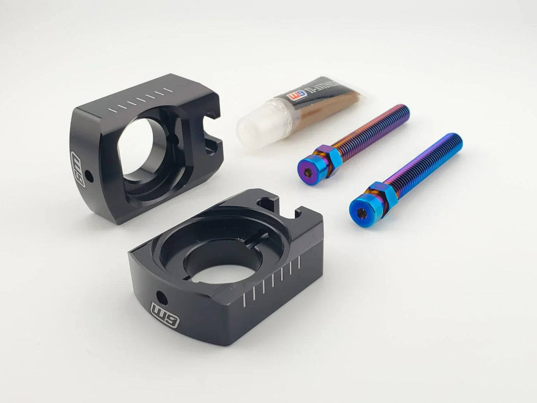 Warp 9 Ultra Bee Axle Blocks with M8 burnt blue titanium adjuster bolts and aluminum keyed axle block design