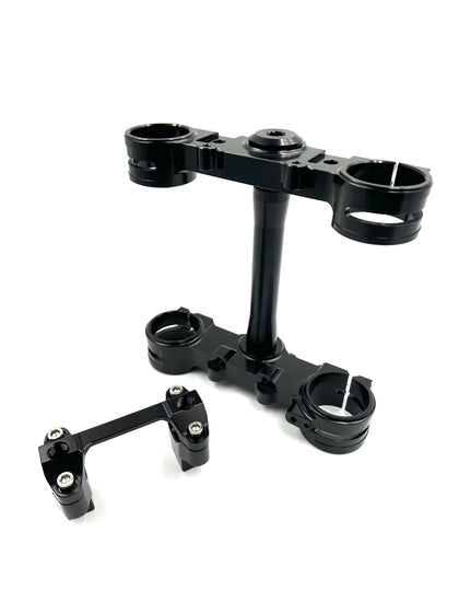 Black Surron Ultra Bee triple clamp and handlebar mount
