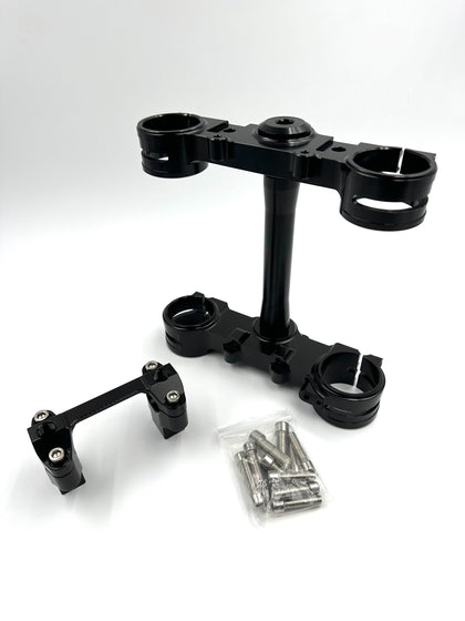 Black Surron Ultra Bee triple clamp and handlebar mount with hardware