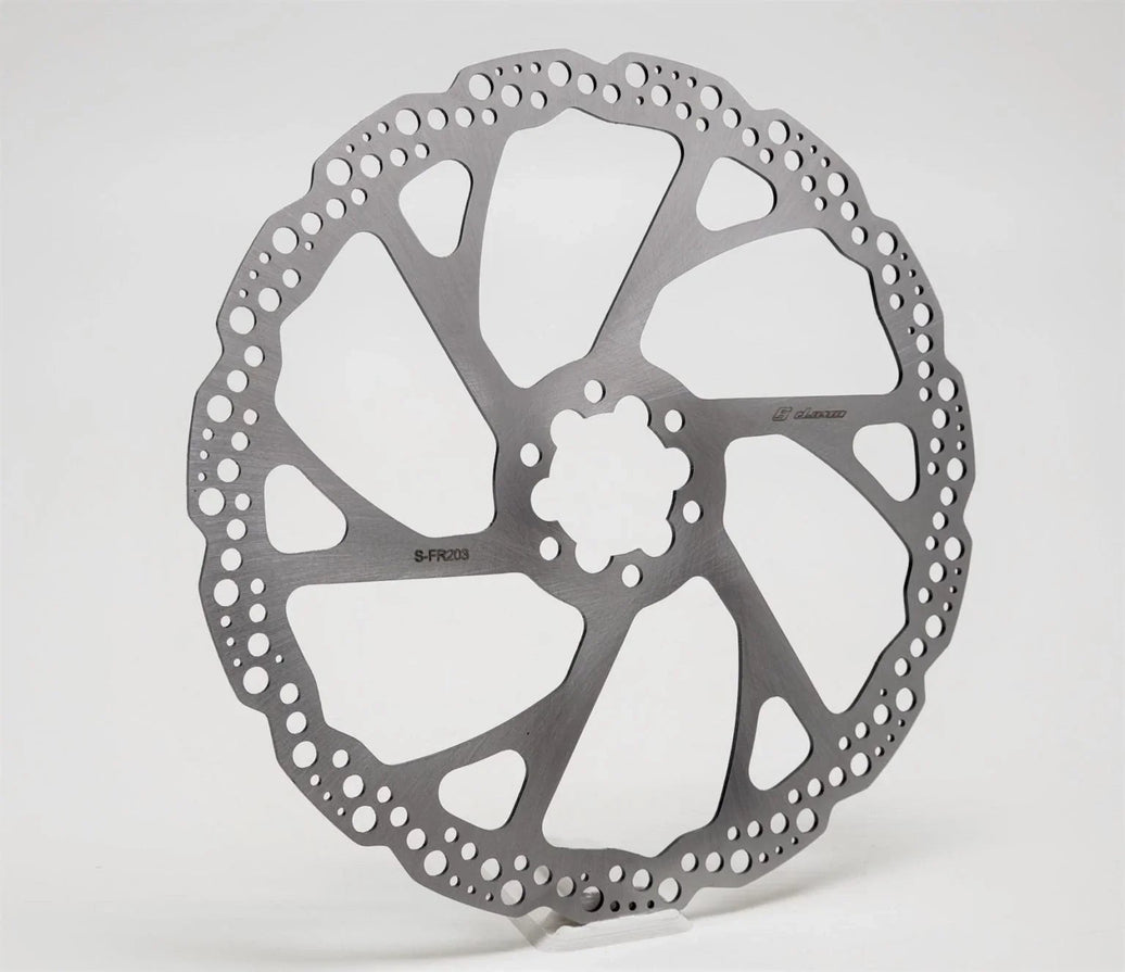 Warp 9 Rear Brake Rotor 203mm fixed OEM Surron hub close-up