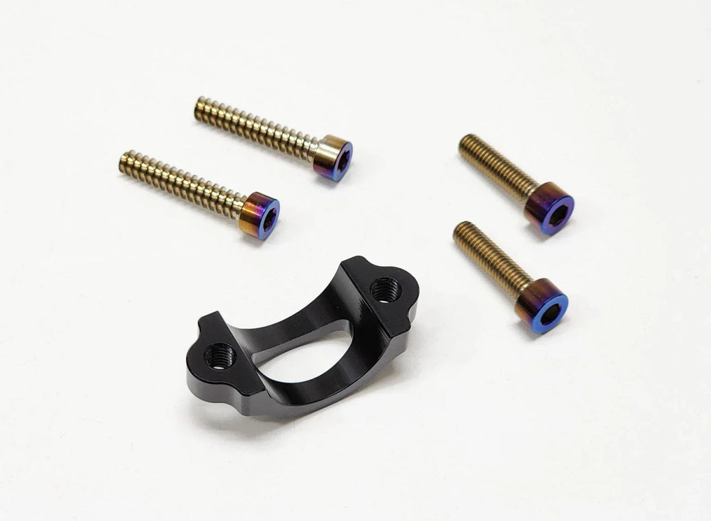 Warp 9 Surron Horn and Light Button Update Kit with burnt titanium screws and back half bracket for Surron bikes