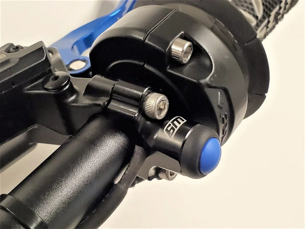 Warp 9 Surron LBX Light Button with burnt titanium screws and extended wire for brake mounts