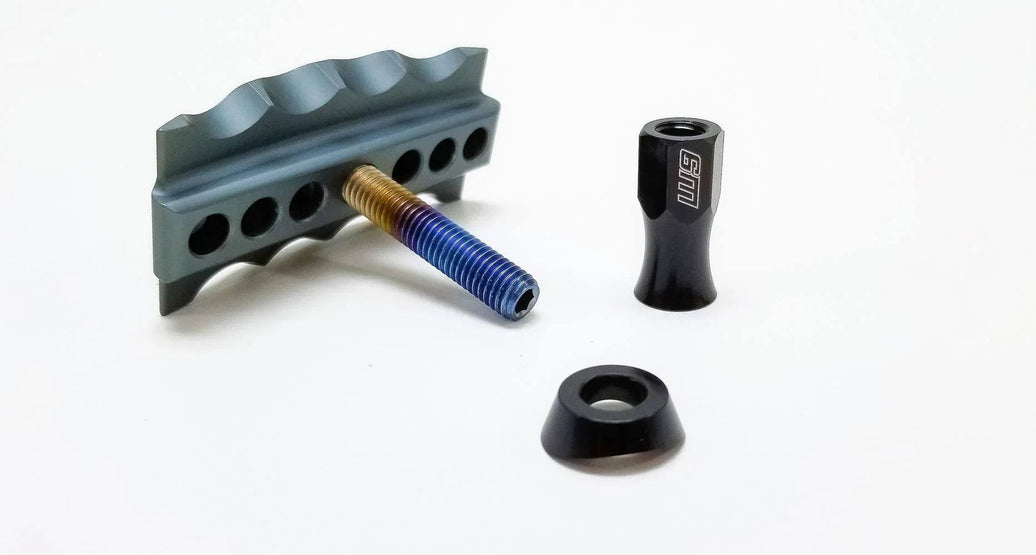 Warp 9 Titanium Pro Rim Locks with burnt titanium bolt and lightweight forged aluminum body for Surron Talaria E-Ride Pro.