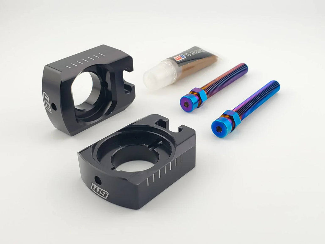 Warp 9 Ultra Bee Axle Blocks with M8 burnt blue titanium adjuster bolts and aluminum keyed axle block design