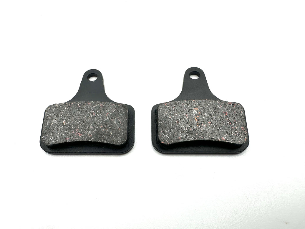 Two brake pads on a white background